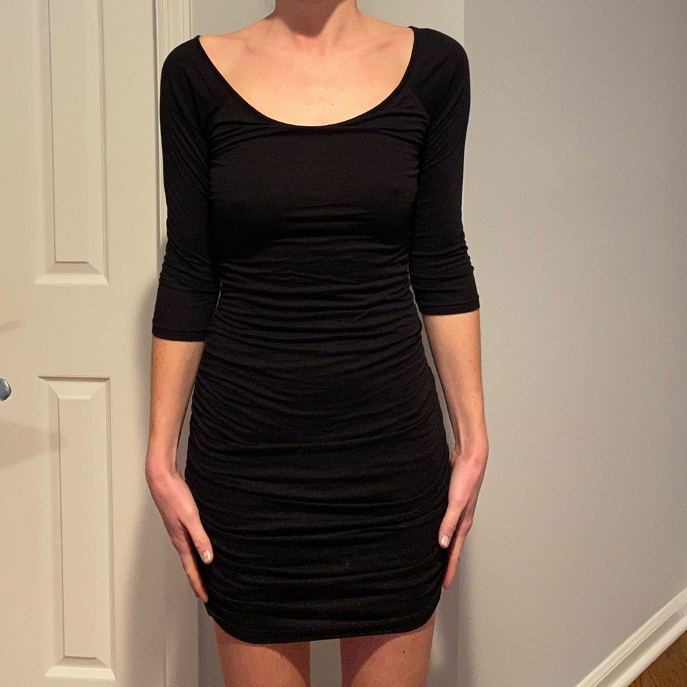 Black Mini Dress Quarter length sleeves.